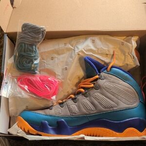 Gray and Blue High-Top Sneakers with Orange Accents